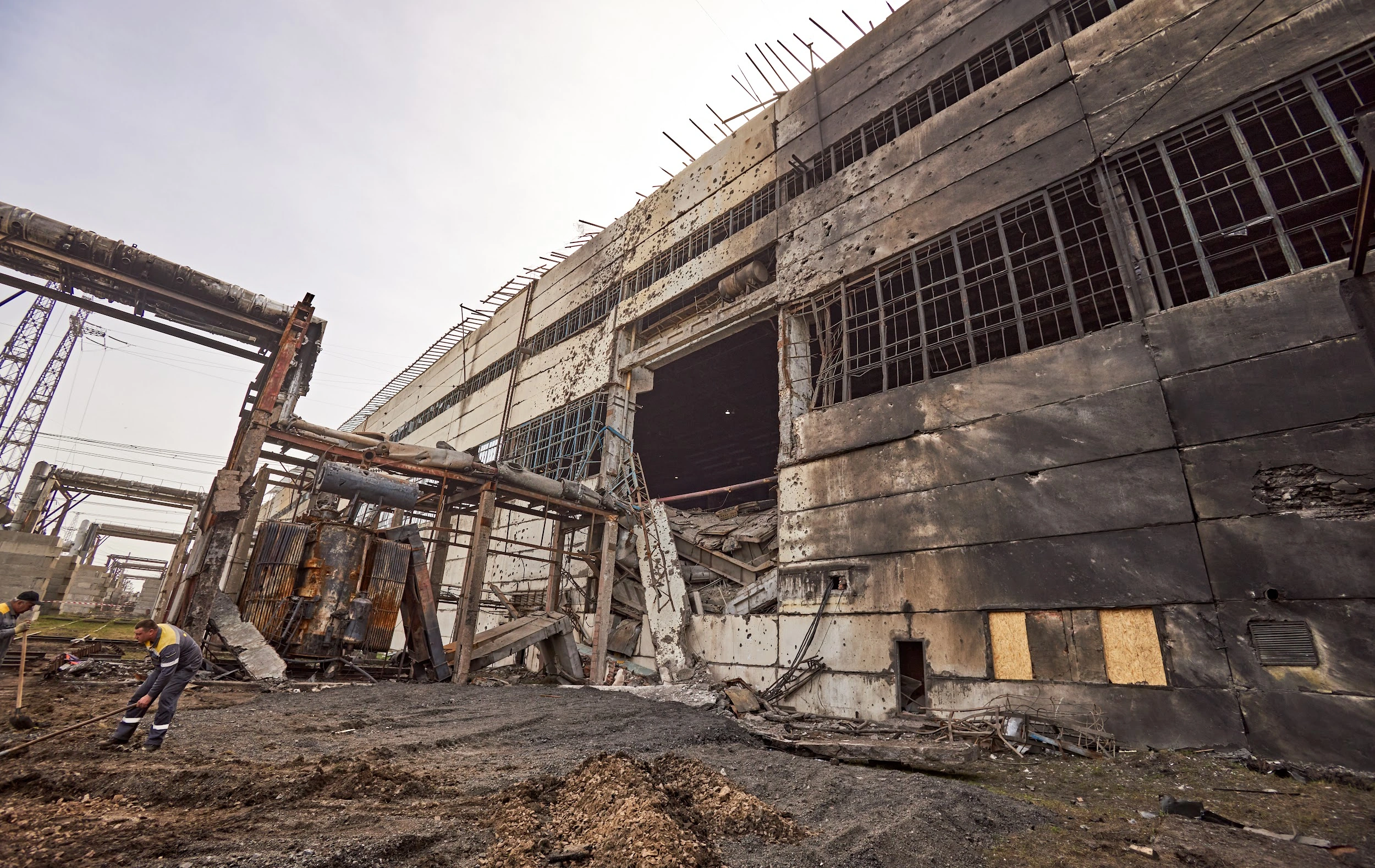 A DTEK employees work to restore a DTEK power station after russian attacks in March 2024. The precise location and date are not disclosed due to security restrictions.