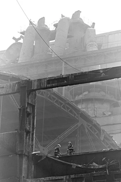 A DTEK employees work to restore a DTEK power station after russian attacks in March 2024. The precise location and date are not disclosed due to security restrictions.