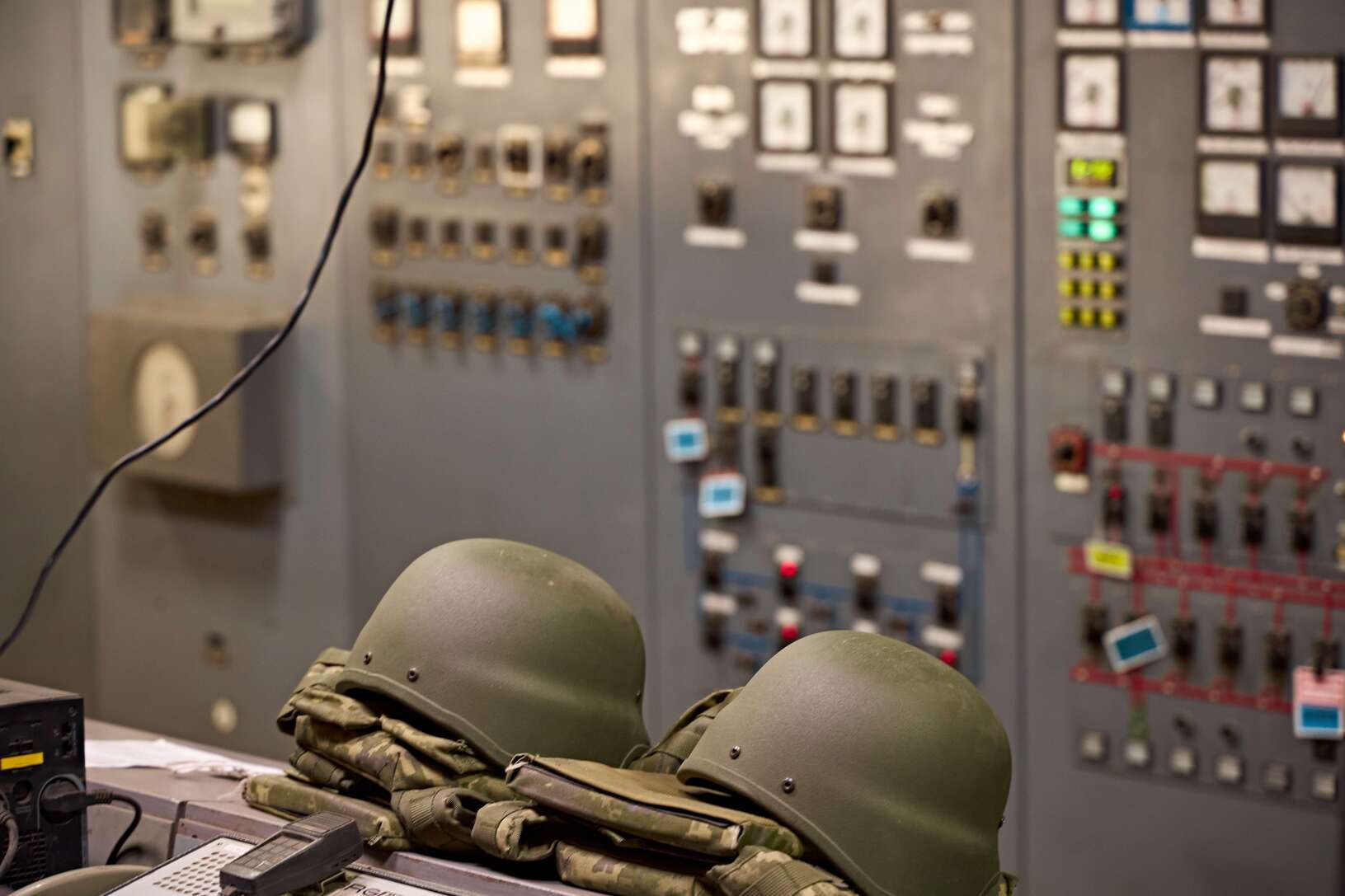 Protective gear worn by DTEK power engineers during air raid alarms